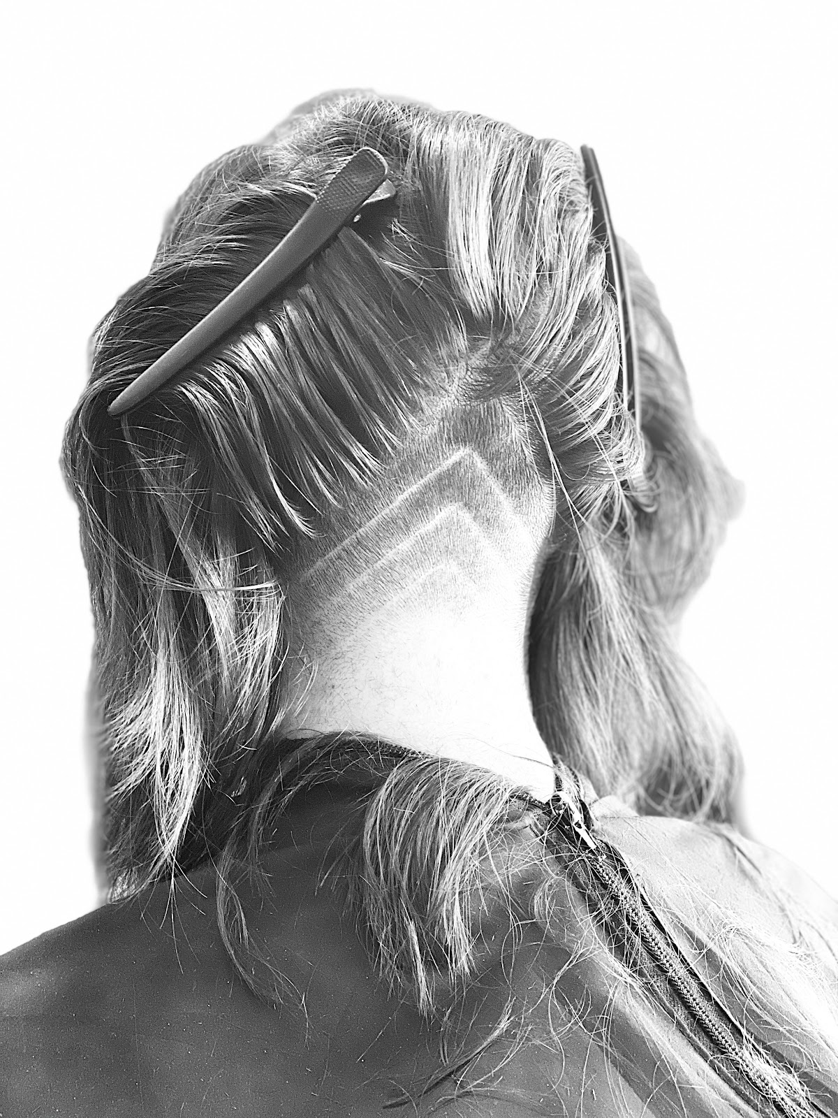 Chevron undercut line design on longer hair